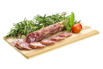 Salami with rosemary, basil and tomato