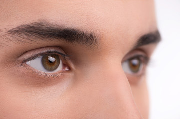Fototapeta premium Makro oczy człowieka. Na białym tle