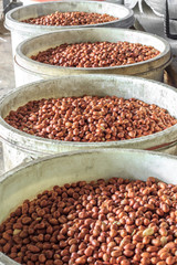 raw peanuts in the tank waiting