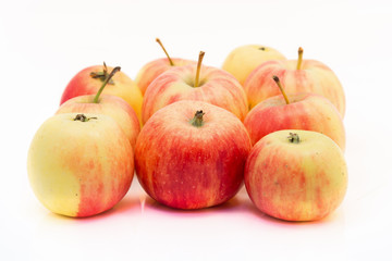 small red and yellow apples isolated