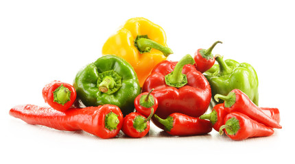 Composition with assorted peppers isolated on white background