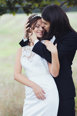 The wedding of a young couple outdoors