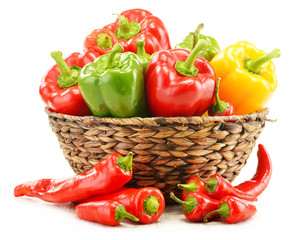 Composition with assorted peppers isolated on white background