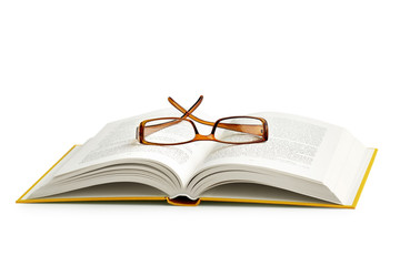 reading glasses on an open book