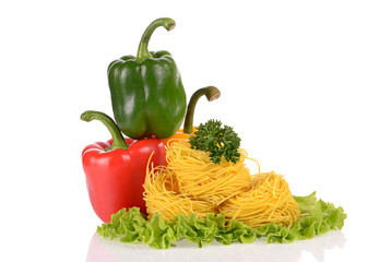 Red Green and Yellow peppers, tasty vermicelli nests with parsle