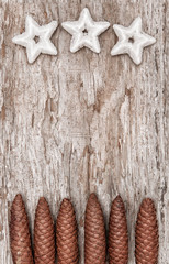 Christmas background with star shapes and cones