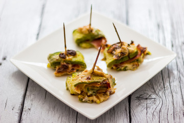 Zucchini and bacon rolls baked
