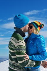 Young Couple In Winter  Snow Scene