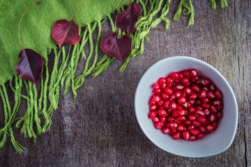 Pomegranate with green table cover