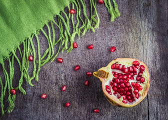 Pomegranate with green table cover