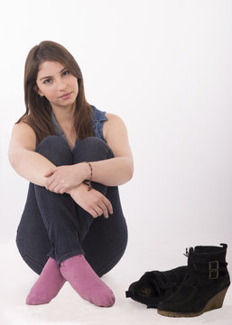 Beautiful young model with brown hair, slim and youthful