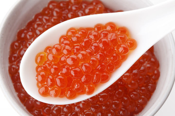 Red caviar on the spoon