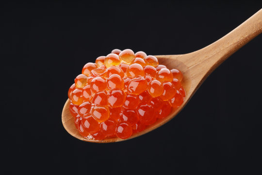 Red caviar on the spoon