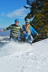 Young Couple In Winter  Snow Scene