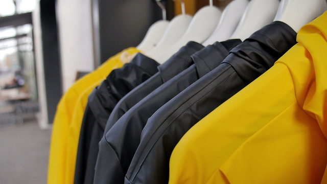 Raincoats on a Shop Rack 
