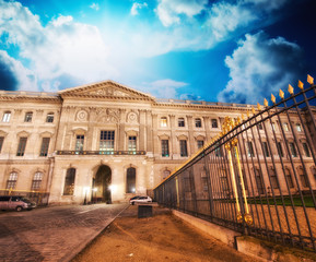 Wonderful sky colors over Paris streets and ancient buildings