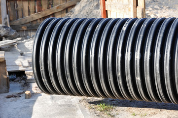 Great black PVC pipe on construction site