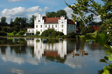 Fototapeta na wymiar Wanås (Wanas, Vanås, Vanas) Castle in Sweden with Reflection in the Lake