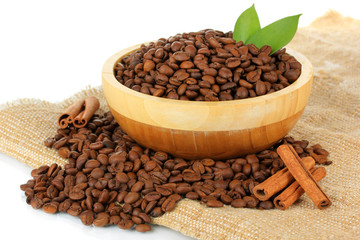 Coffee beans in bowl on white background