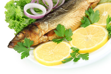 Smoked fish on plate close up