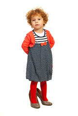 Little girl in mommys shoes