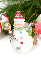 snowman with sweets isolated on white background