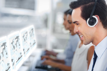 Call center staff at work on futuristic interfaces showing maps