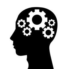 Abstract human head silhouette with gear set as a brain