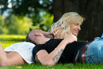 Laughing young couple enjoying the spring