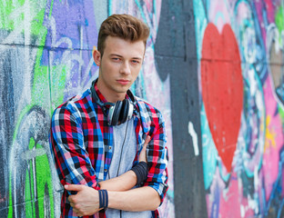 Obraz premium Young boy listening to music