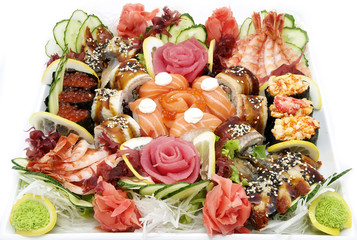 Japanese rolls in a restaurant with fish and vegetables