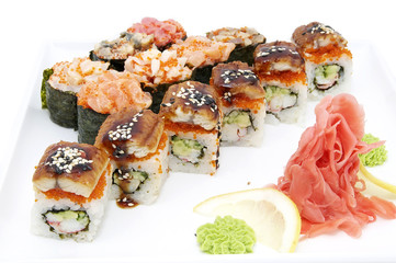 Japanese rolls in a restaurant with fish and vegetables