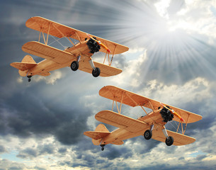Retro style picture of the biplanes. Transportation theme.