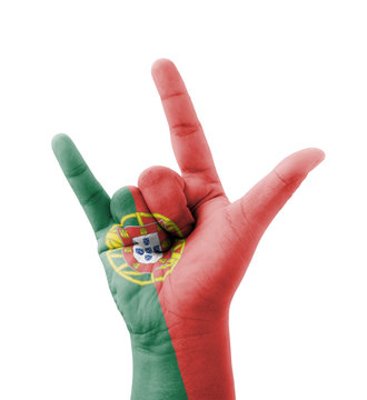 Hand making I love you sign, Portugal flag painted