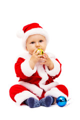 Small Santa with toys and spheres in hands