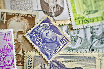 Fototapeta na wymiar mixture of old stamps from various countries