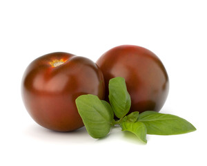 Tomato kumato and basil leaf