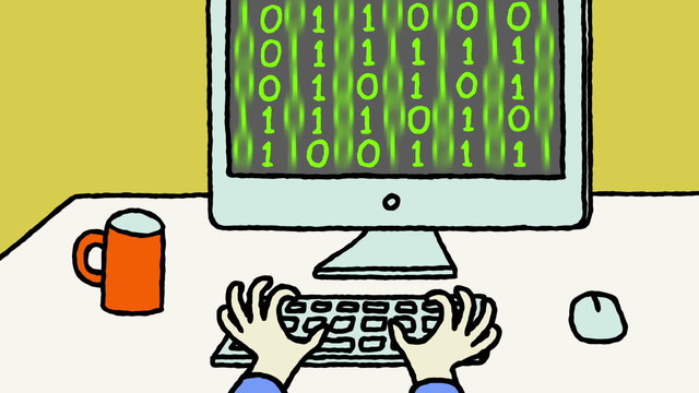 Hands typing rapidly on a computer keyboard.