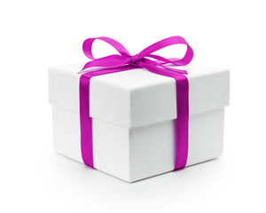 white textured gift box with purple ribbon bow