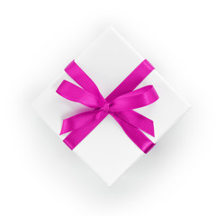 white textured gift box with purple ribbon bow