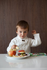 Boy, eating fruit sandwich