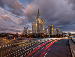Fototapeta premium Skyscraper on Kotelnicheskaya Embankment and Traffic Trails at D