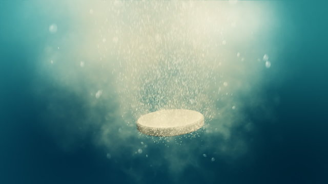 Fizzy pill dissolves in the water - loop