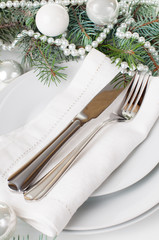 Christmas table setting, table decoration in white