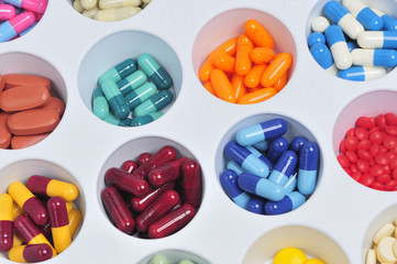 assortment of pills and capsules