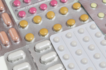 assortment of pills and capsules