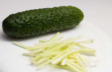 Sliced cucumber on white background