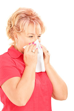 Infected Mature Woman Blowing Her Nose In Tissue Because Of Bein