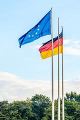 European union flag with german flag in the sky