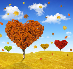 Autumn landscape with tree in the shape of heart
